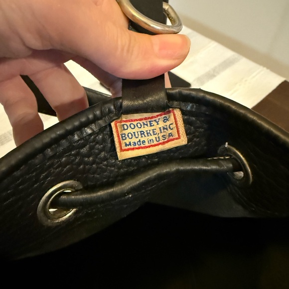 $50- Vintage Dooney & Bourke Made in USA
Drawstring One Sling Backpack - Picture 8 of 13